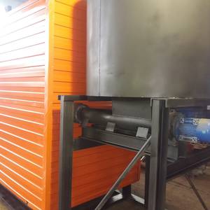 Котёл КВм-1,65 на древесных отходах со шнековой подачей