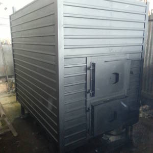 Котёл КВр-0,2 на древесных отходах с топкой ОУР