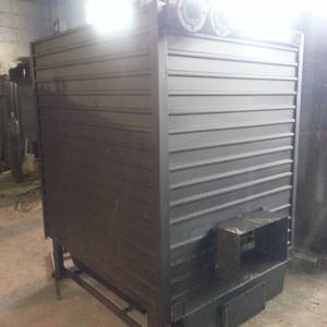 Котёл КВр-0,55 на древесных отходах с топкой ОУР