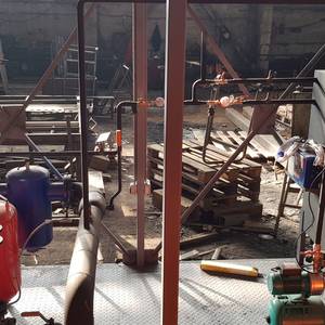 Модульная котельная МКУ-1,25 на основе котла КВм-1,25 на древесных отходах со шнековой подачей